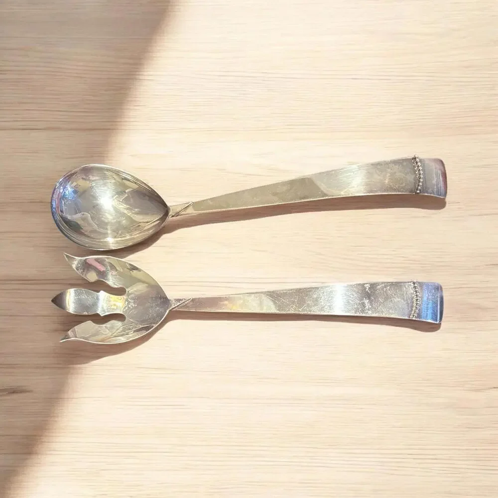 Stainless Three Crowns Silversmiths 2 piece Salad Serving set.  These are mid ce